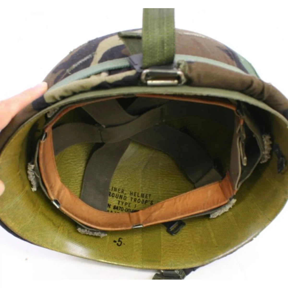 US army M1 Helmet with Woodland cover, surplus in good condition. Vietnam War era.